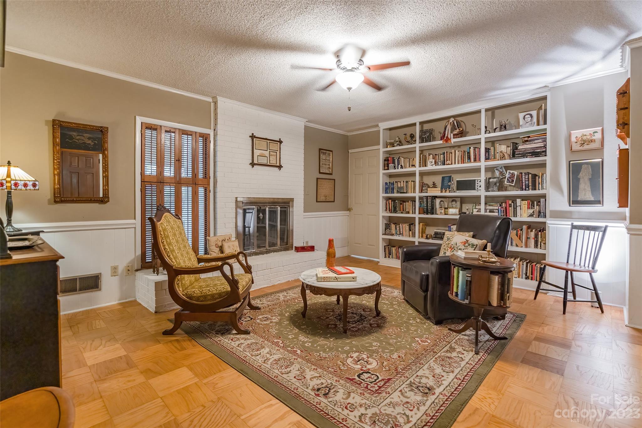 6916 Thermal Road Charlotte, NC 28211 - Photo 28 of 47 a living room with furniture and a fireplace