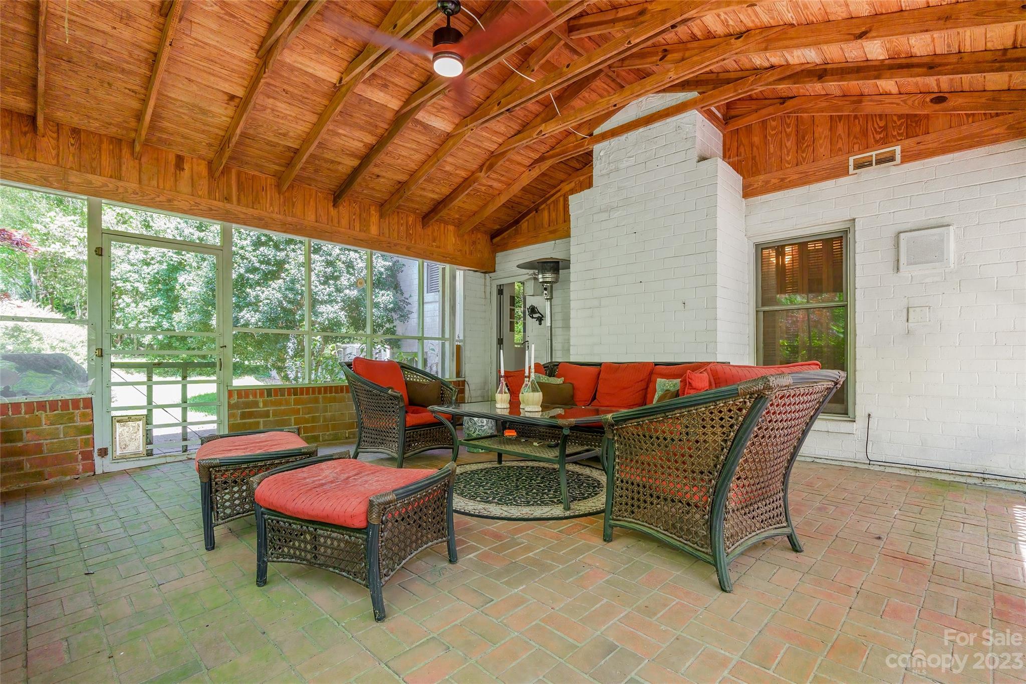 6916 Thermal Road Charlotte, NC 28211 - Photo 38 of 47 a building outdoor space with patio furniture and potted plants