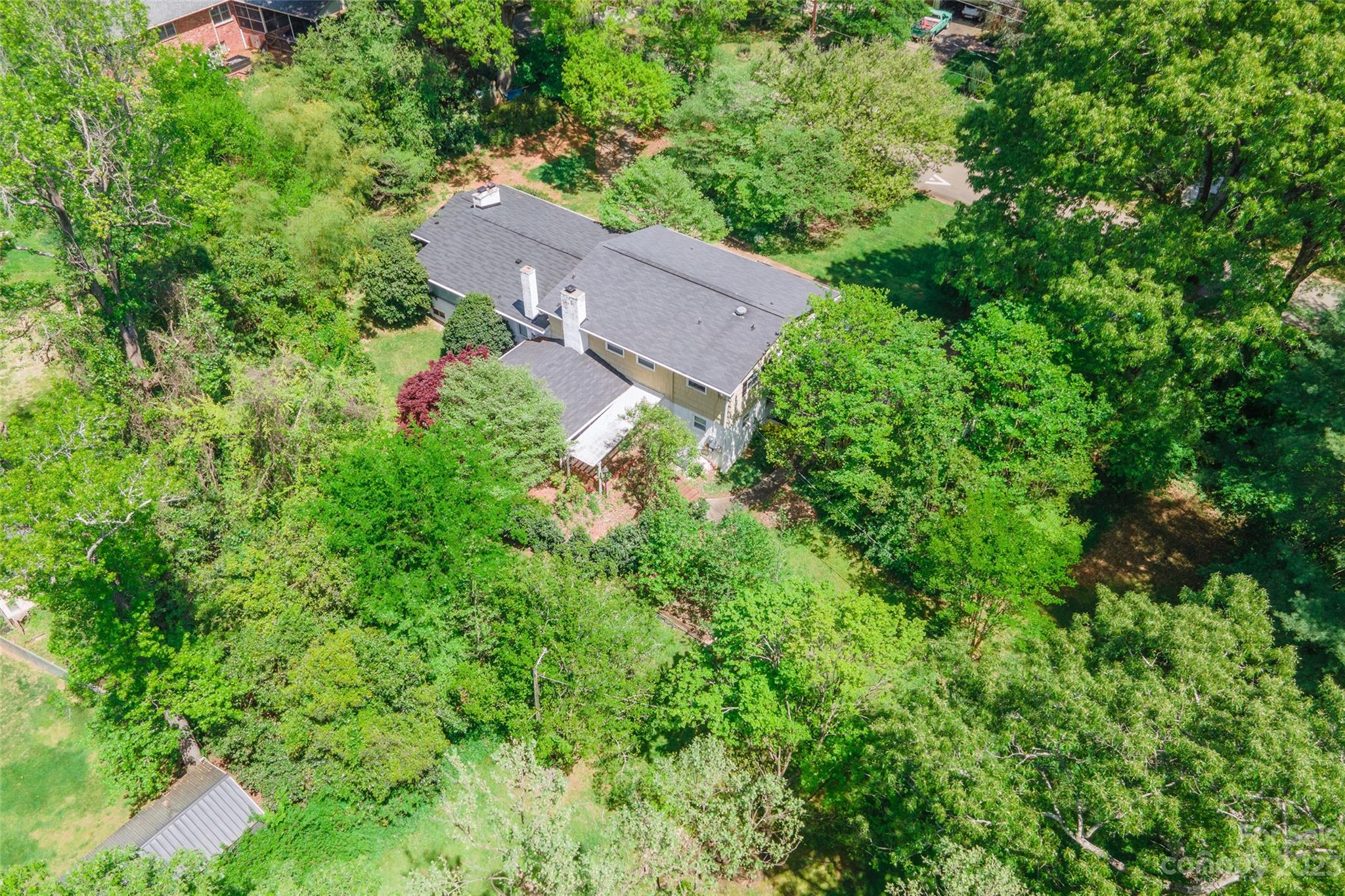 6916 Thermal Road Charlotte, NC 28211 - Photo 44 of 47 an aerial view of a house with yard