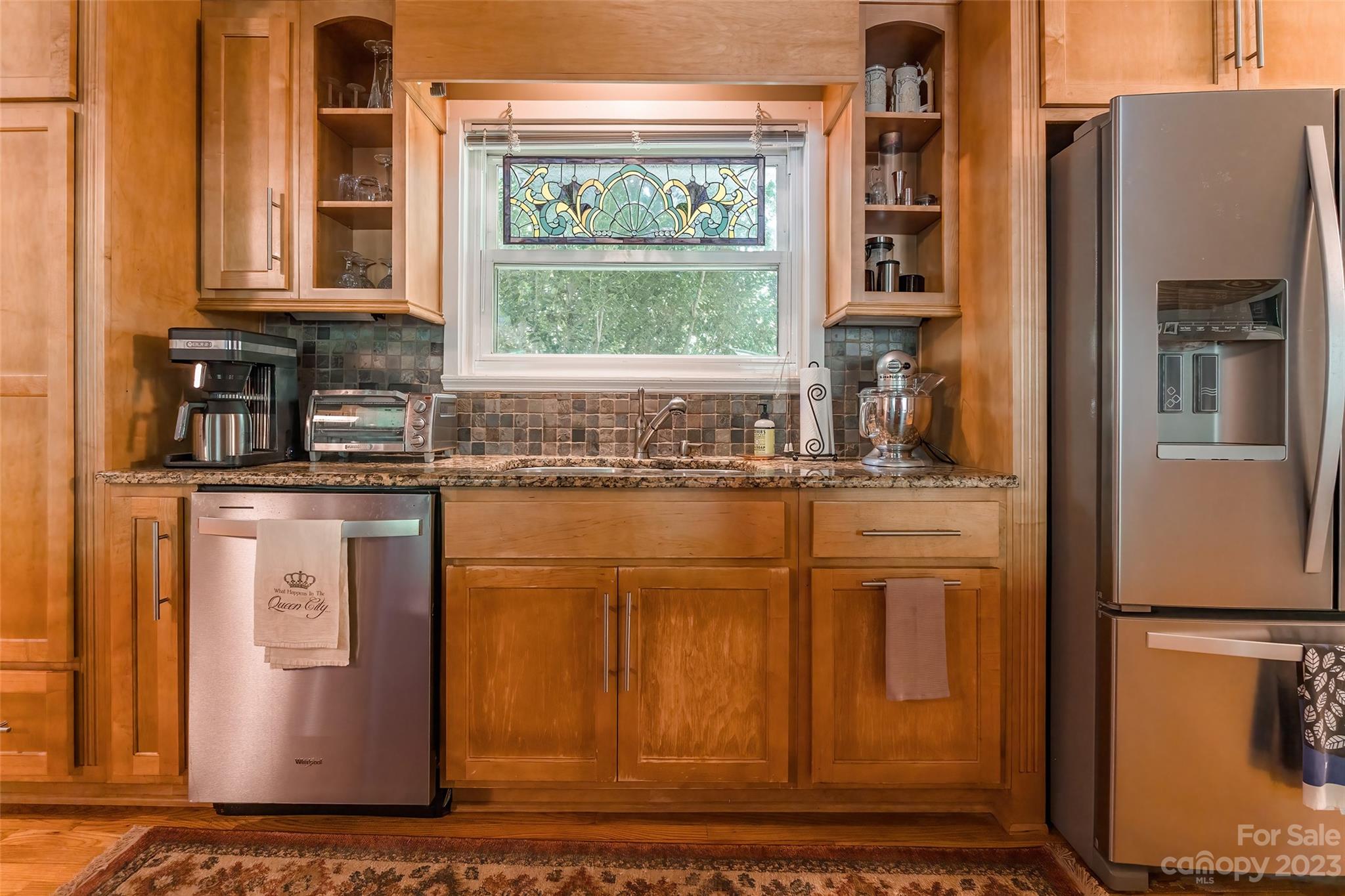 6916 Thermal Road Charlotte, NC 28211 - Photo 10 of 47 a kitchen with stainless steel appliances granite countertop a refrigerator and a stove
