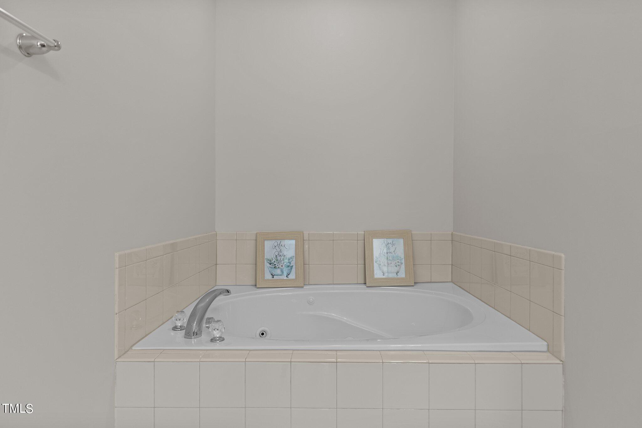 439 Panorama View Loop Cary, NC 27519 - Photo 31 of 42 a bathroom with a bathtub