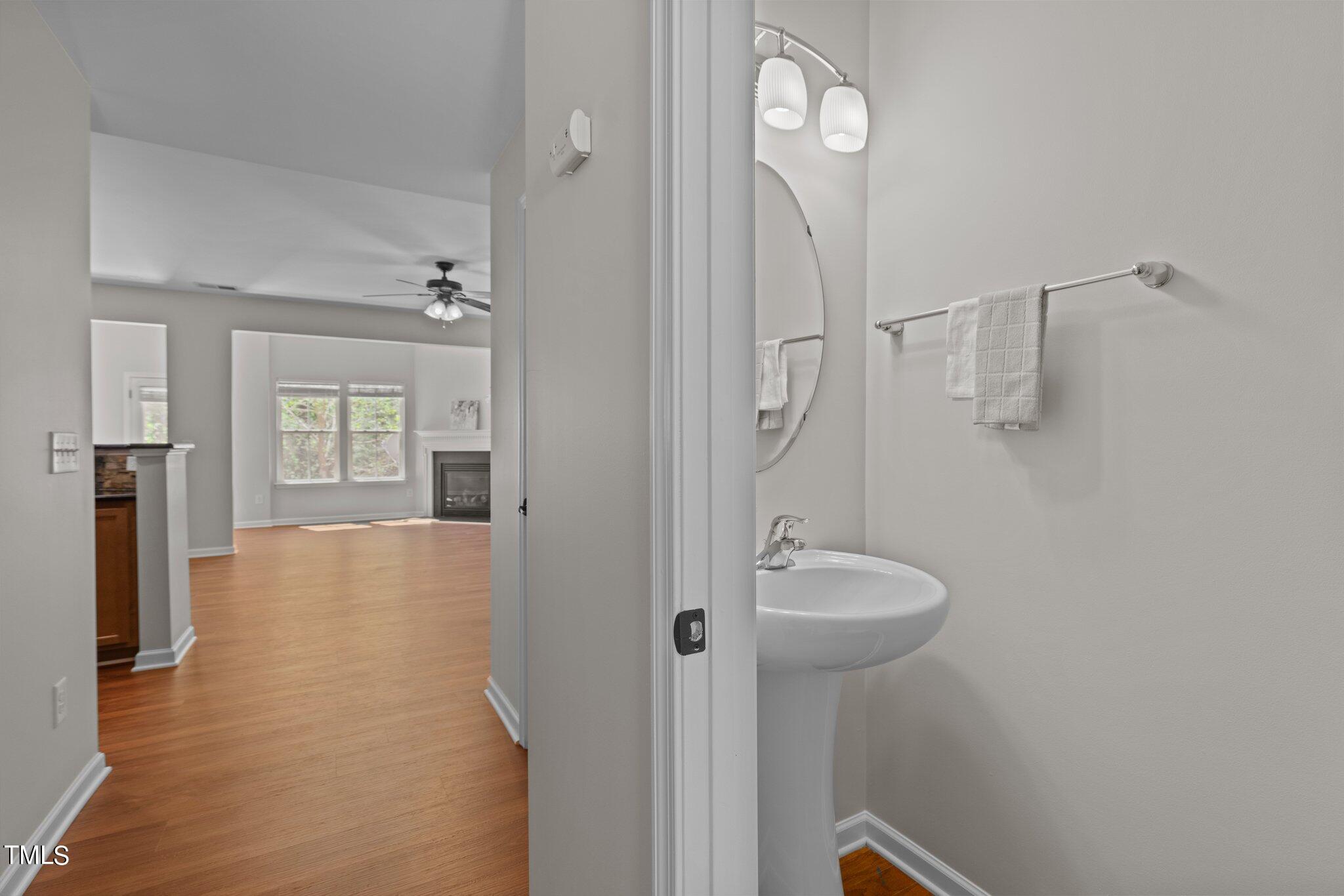 439 Panorama View Loop Cary, NC 27519 - Photo 5 of 42 a bathroom with a sink a toilet and shower