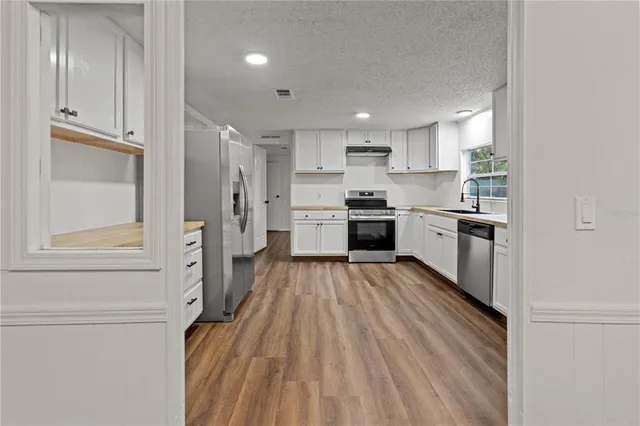 a large kitchen with a lot of counter space