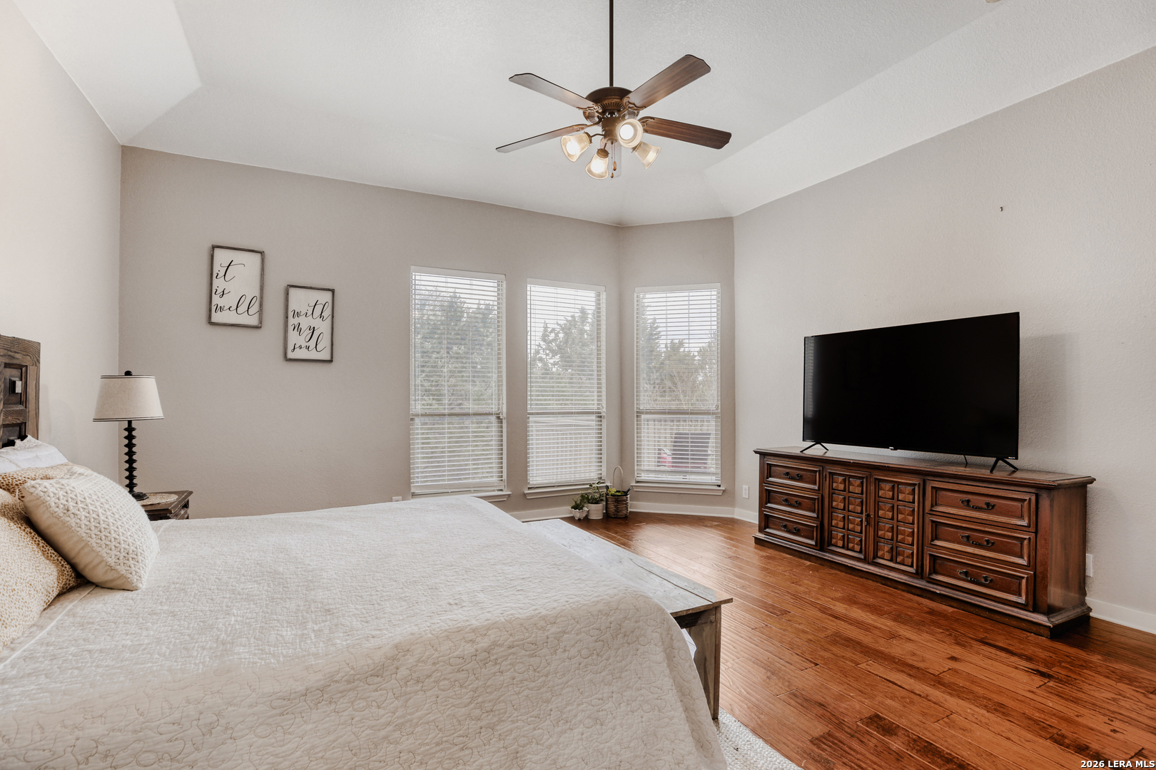 8330 Magdalena Run Helotes, TX 78023 - Photo 15 of 24 a bedroom with a bed and a flat screen television