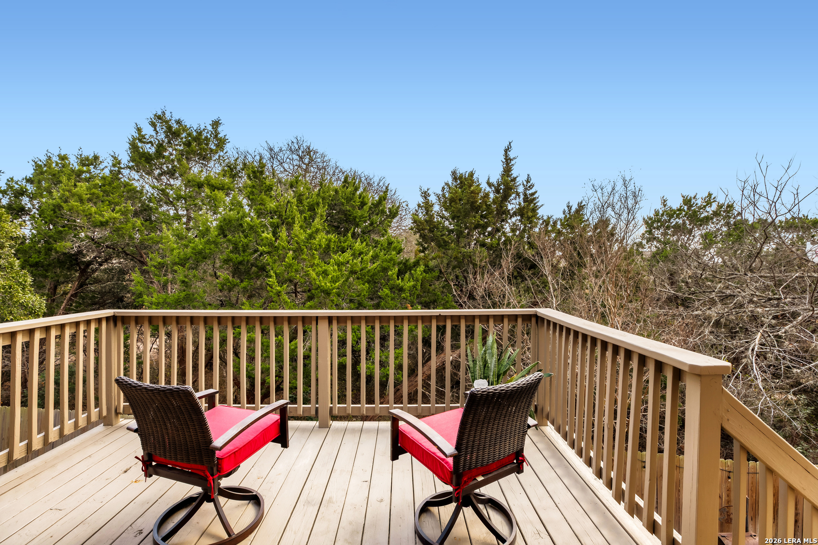8330 Magdalena Run Helotes, TX 78023 - Photo 24 of 24 a roof deck with a table and chairs