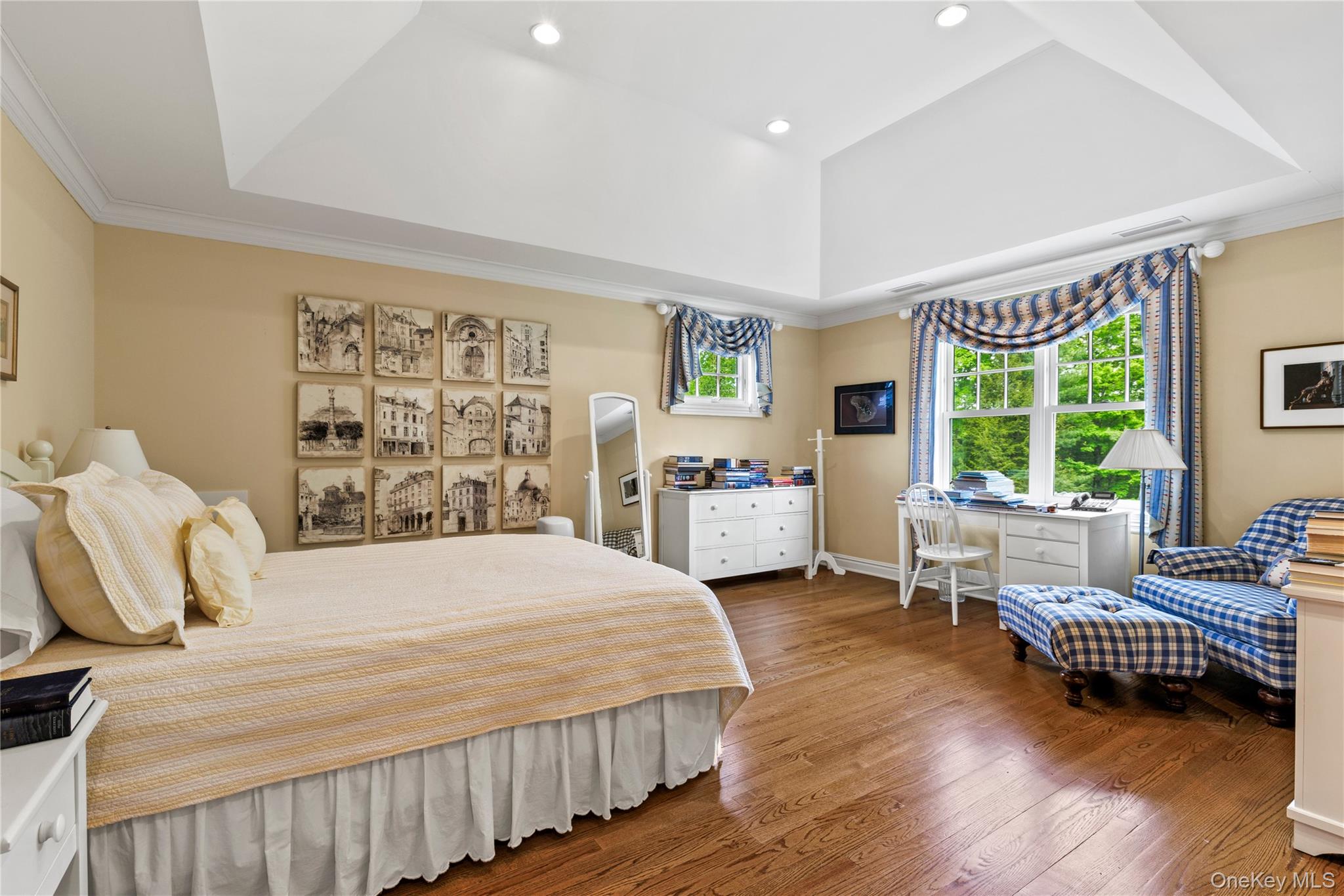 63 Old Mill River Road Pound Ridge, NY 10576 - Photo 24 of 47 a bedroom with a bed couch and a large window