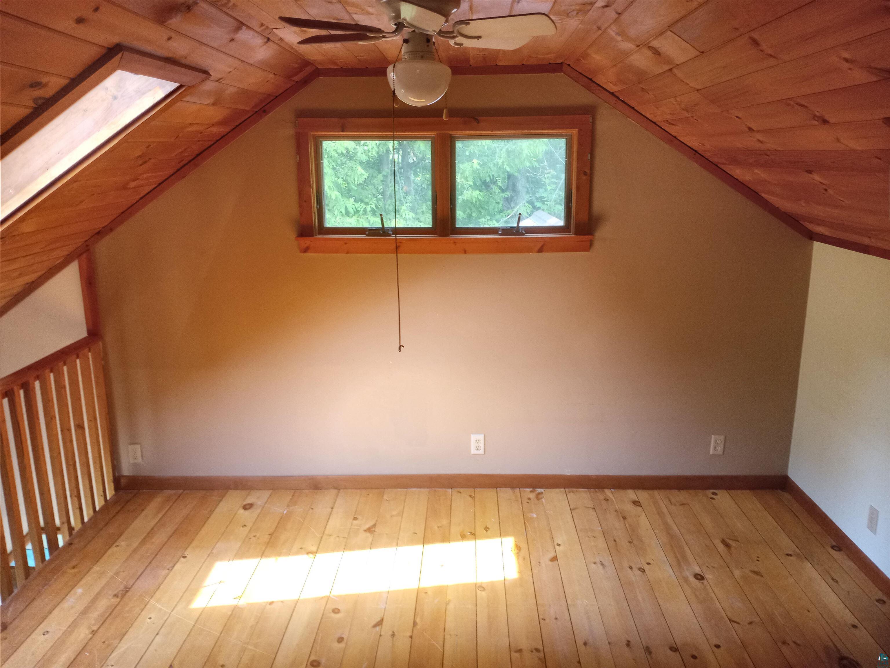 22715 Elm Street Cornucopia, WI 54827 - Photo 22 of 23 Loft Bedroom