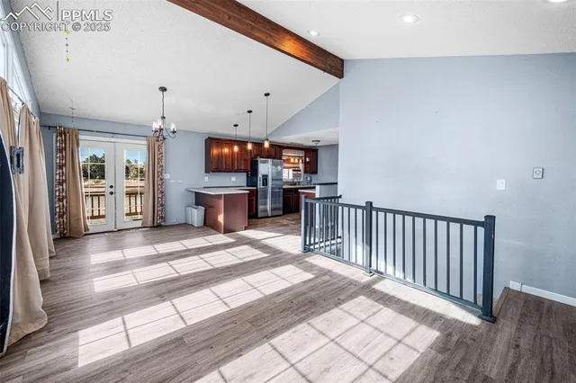 a view of a kitchen and a window