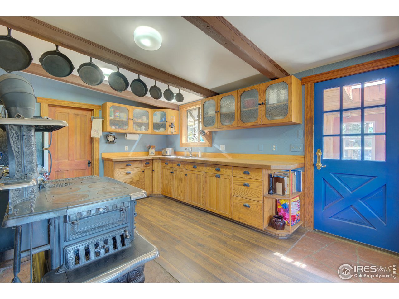 900 Spruce Drive Lyons, CO 80540 - Photo 2 of 40 a kitchen with stainless steel appliances granite countertop a stove a sink and a cabinets