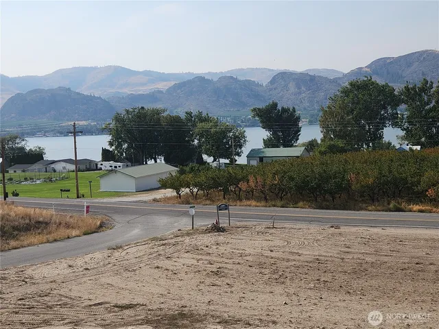 a view of a road with a yard