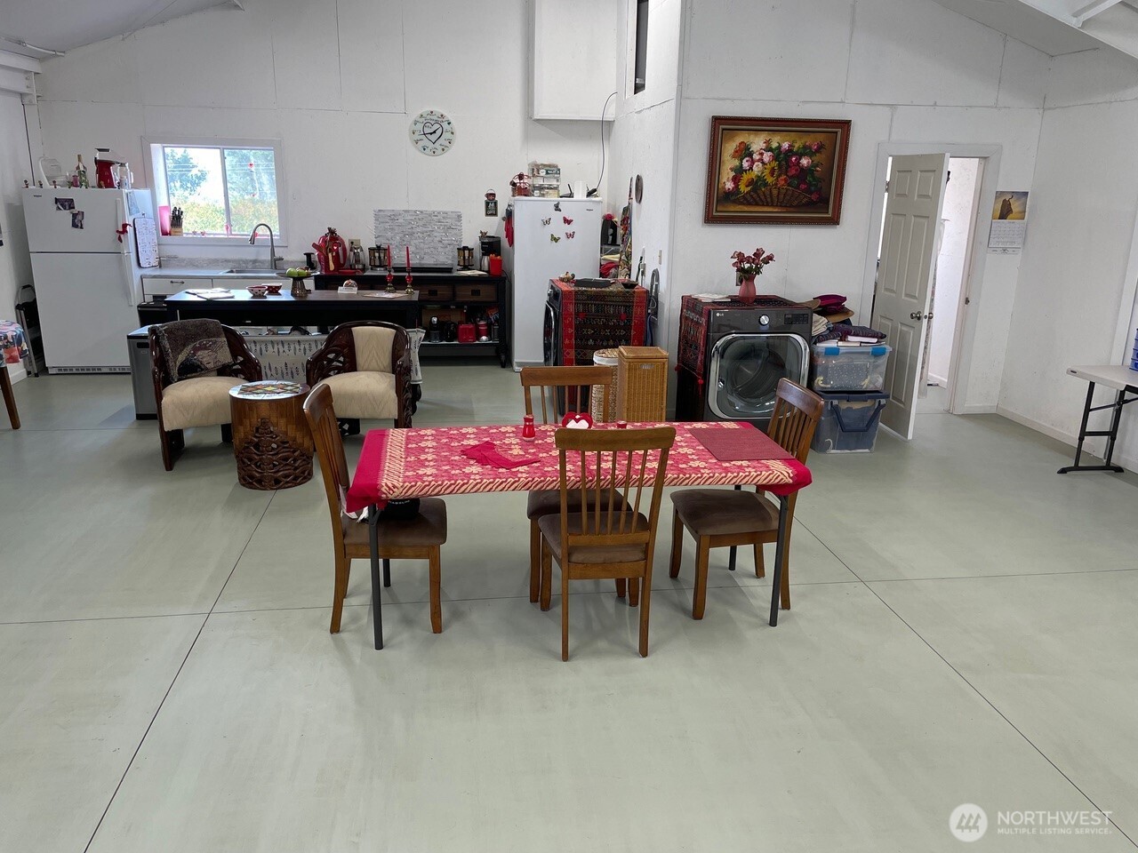 136 Eastlake Road Oroville, WA 98844 - Photo 13 of 20 a living room with furniture and a window