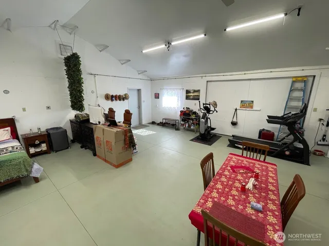 a bed room with furniture and a window