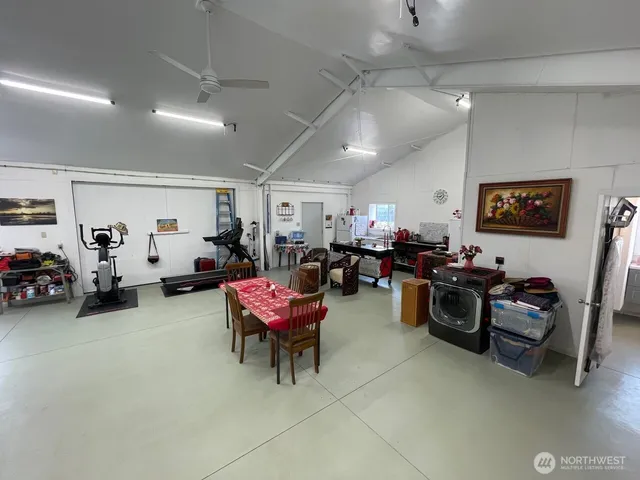 a living room with lots of furniture and a flat screen tv