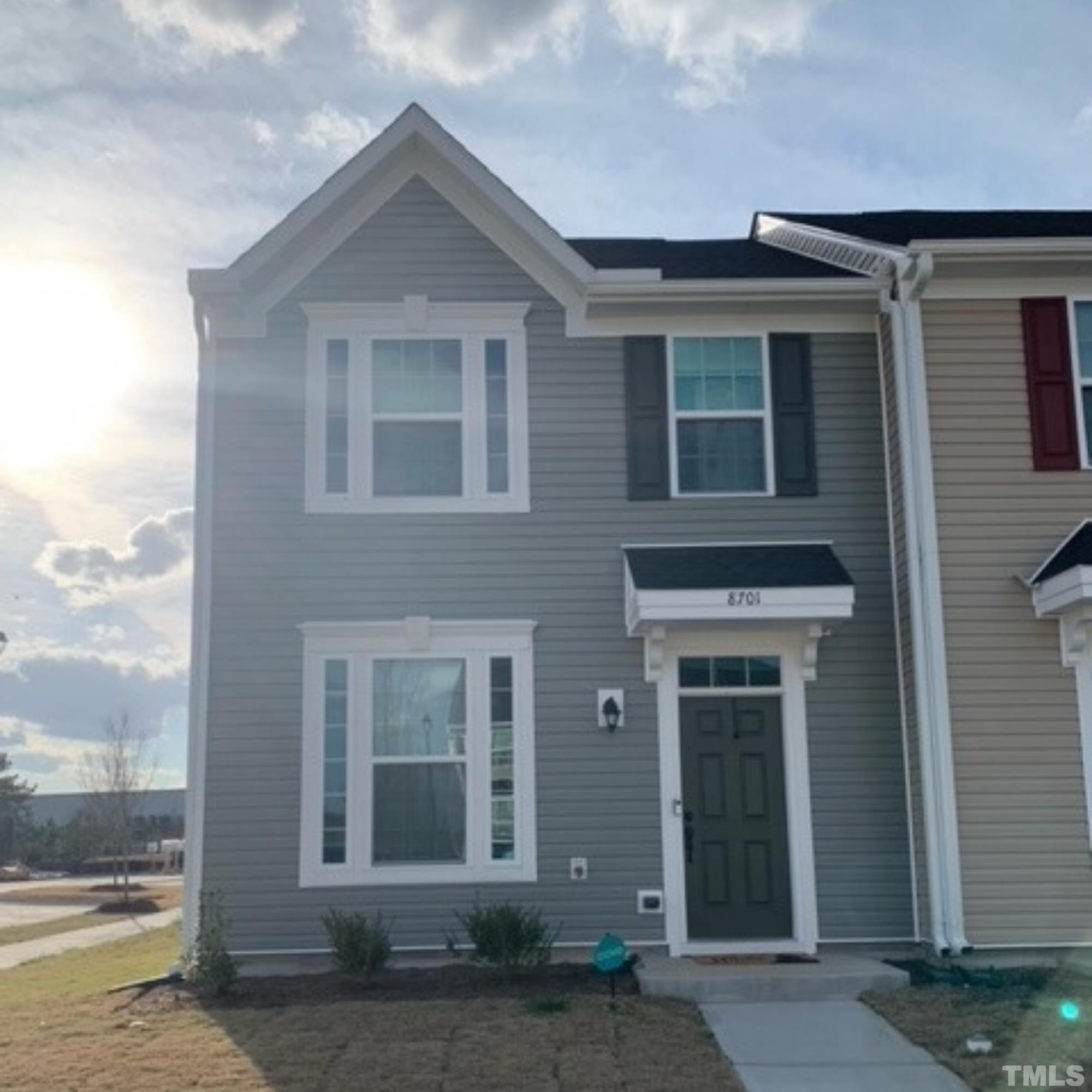 8701 Red Canyon Way Raleigh, NC 27616 - Photo 1 of 28 a front view of a house with a yard