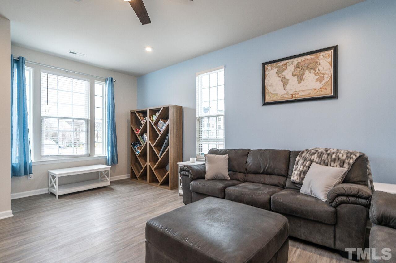 8701 Red Canyon Way Raleigh, NC 27616 - Photo 13 of 28 a living room with furniture and a window
