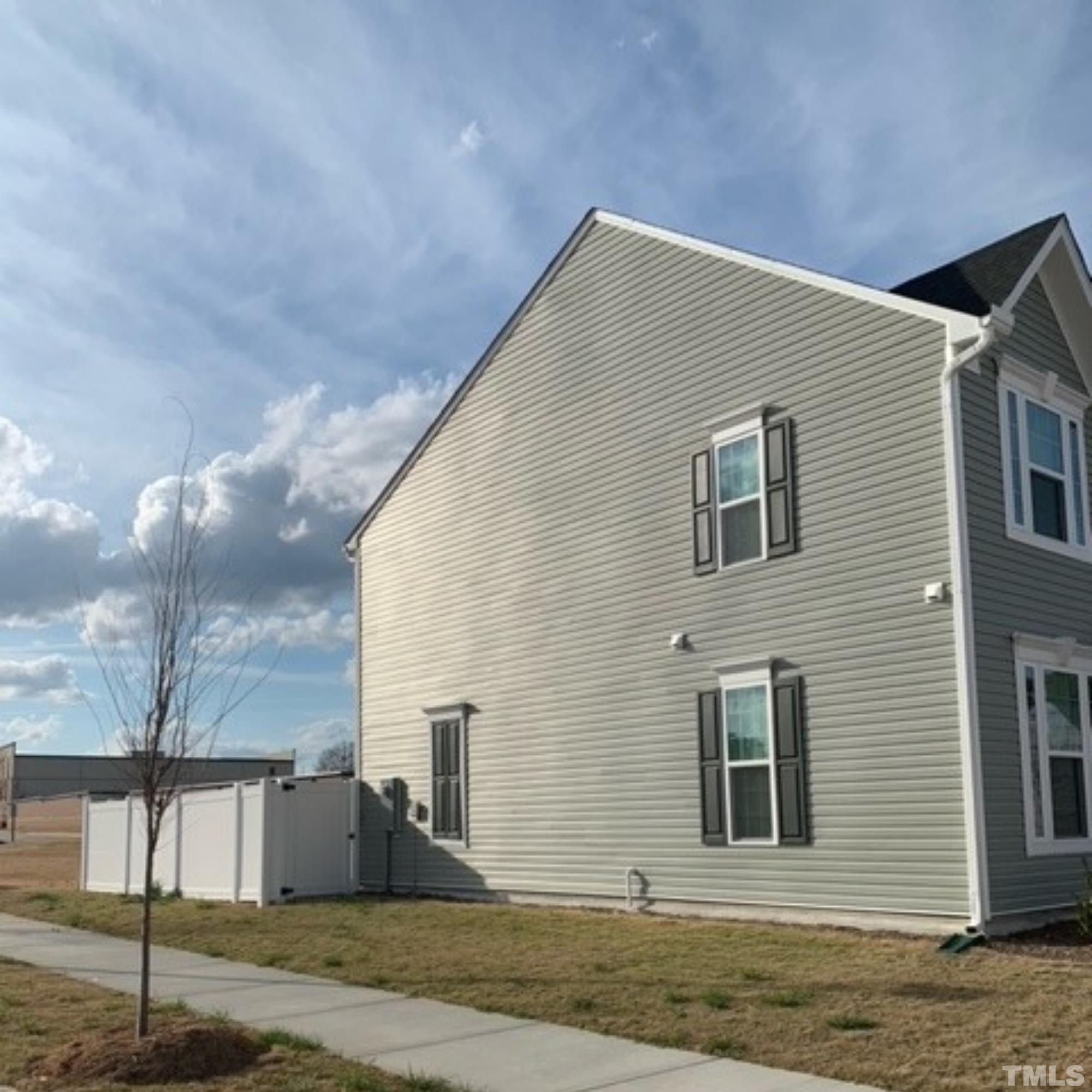8701 Red Canyon Way Raleigh, NC 27616 - Photo 2 of 28 a house that has a tree in front of it
