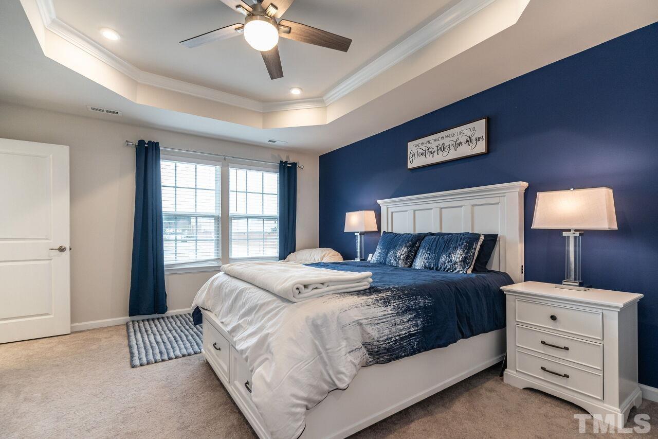 8701 Red Canyon Way Raleigh, NC 27616 - Photo 24 of 28 a bedroom with a bed and a window