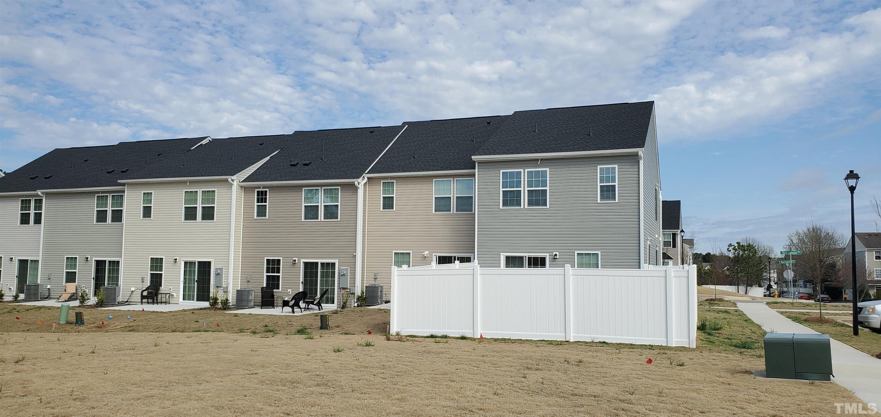 8701 Red Canyon Way Raleigh, NC 27616 - Photo 5 of 28 a front view of a house with a yard