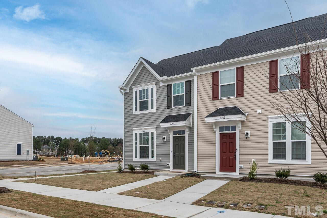 8701 Red Canyon Way Raleigh, NC 27616 - Photo 7 of 28 a front view of a house with a yard