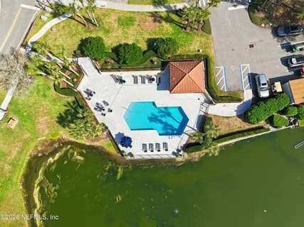a view of an house with backyard