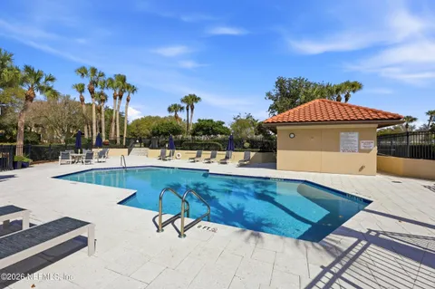 a view of a house with swimming pool