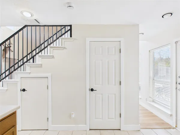 a view of entryway with wooden floor