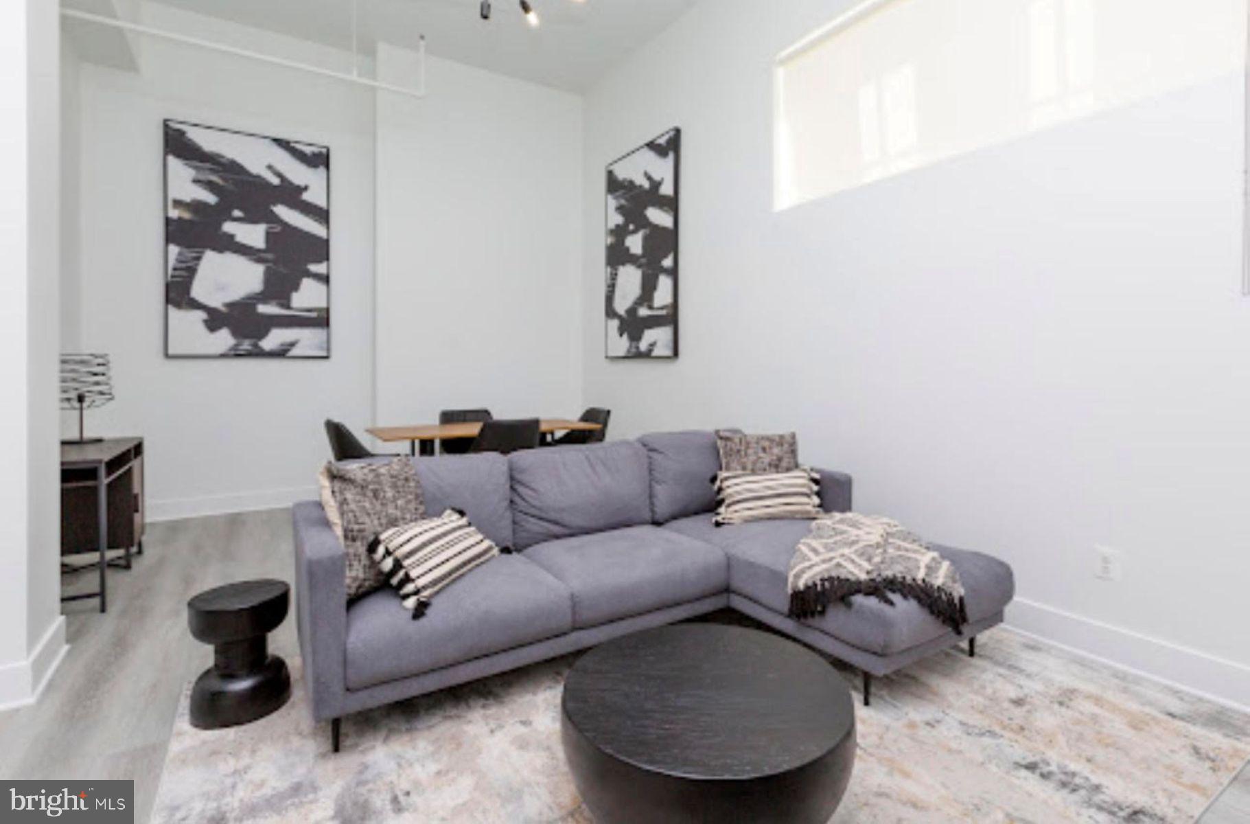 300 Cathedral Street, Unit 304 Baltimore, MD 21201 - Photo 5 of 13 Living Area - Model Home