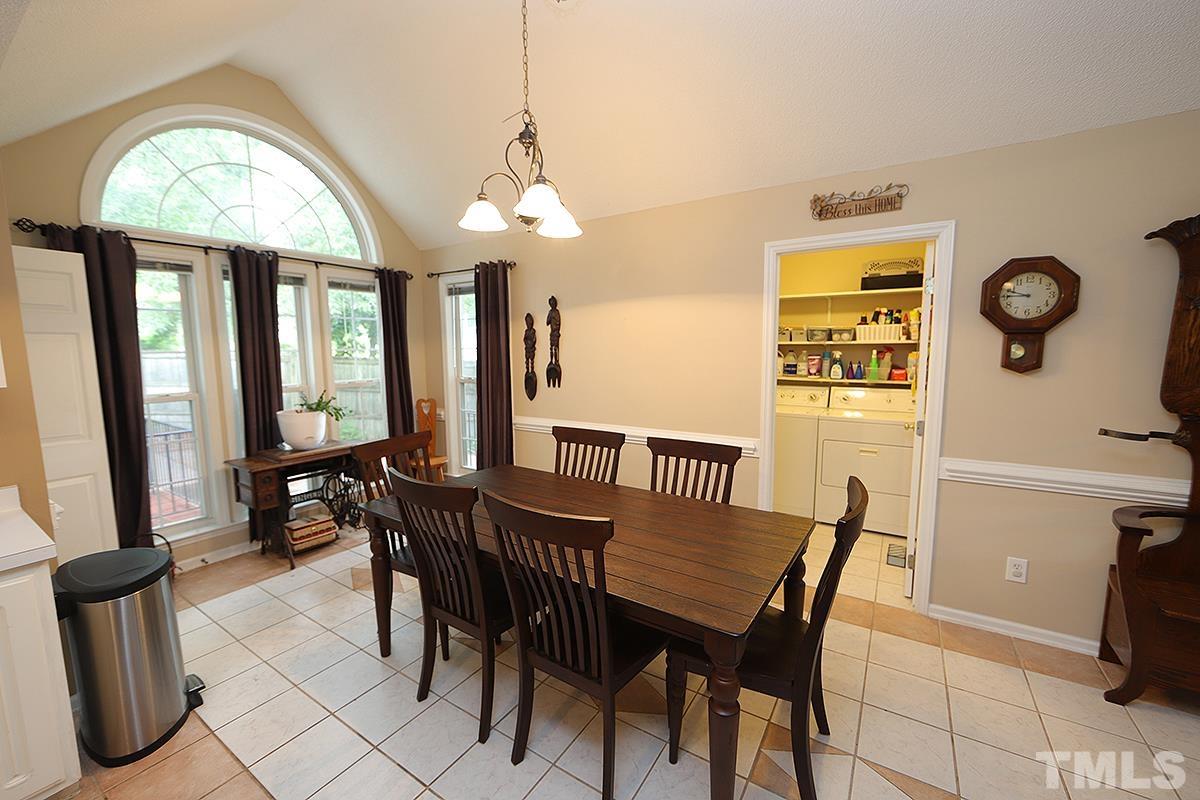 112 Dullis Circle Garner, NC 27529 - Photo 12 of 23 a view of a dining room with furniture window and outside view