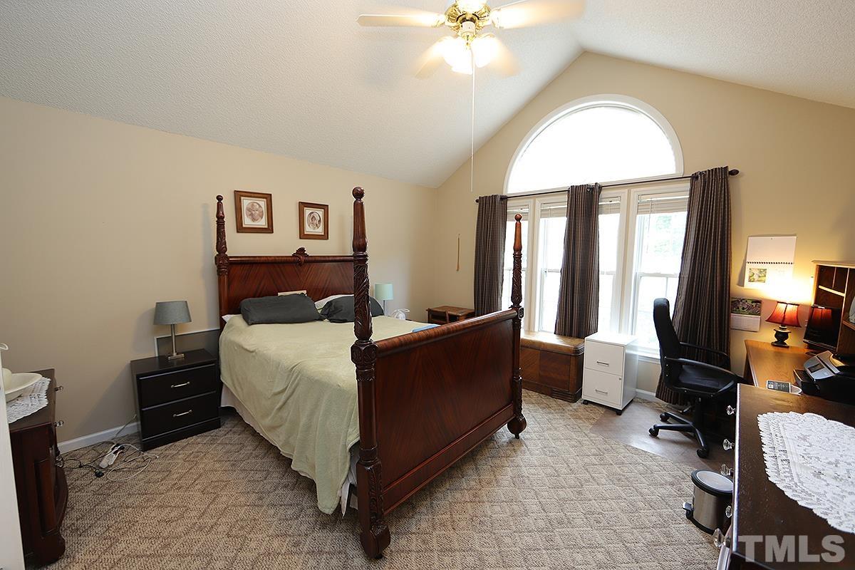 112 Dullis Circle Garner, NC 27529 - Photo 14 of 23 a living room with furniture and a large window