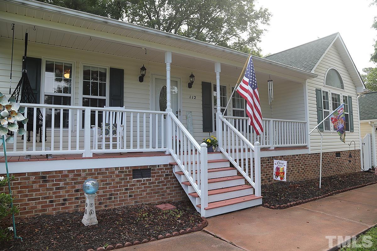112 Dullis Circle Garner, NC 27529 - Photo 2 of 23 a view of deck with a yard
