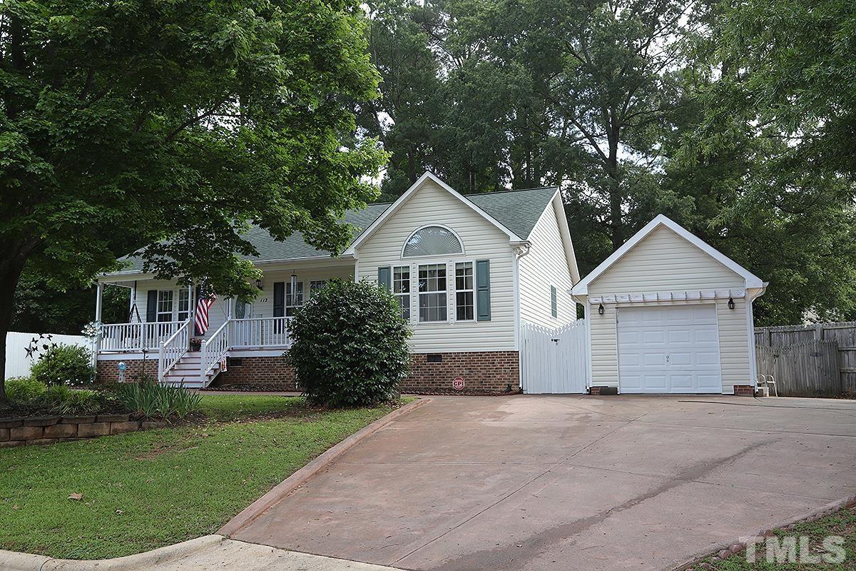 112 Dullis Circle Garner, NC 27529 - Photo 3 of 23 a front view of house with yard and green space