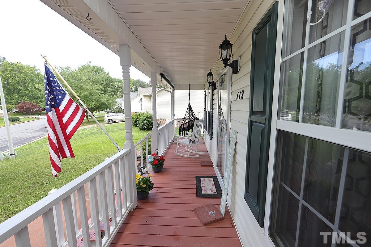 112 Dullis Circle Garner, NC 27529 - Photo 4 of 23 a view of a pathway of a building from a balcony