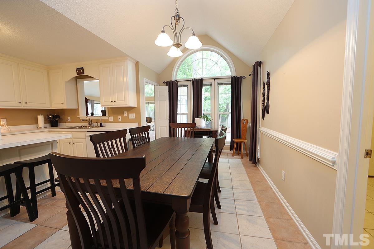 112 Dullis Circle Garner, NC 27529 - Photo 9 of 23 a very nice looking dining room with a large window