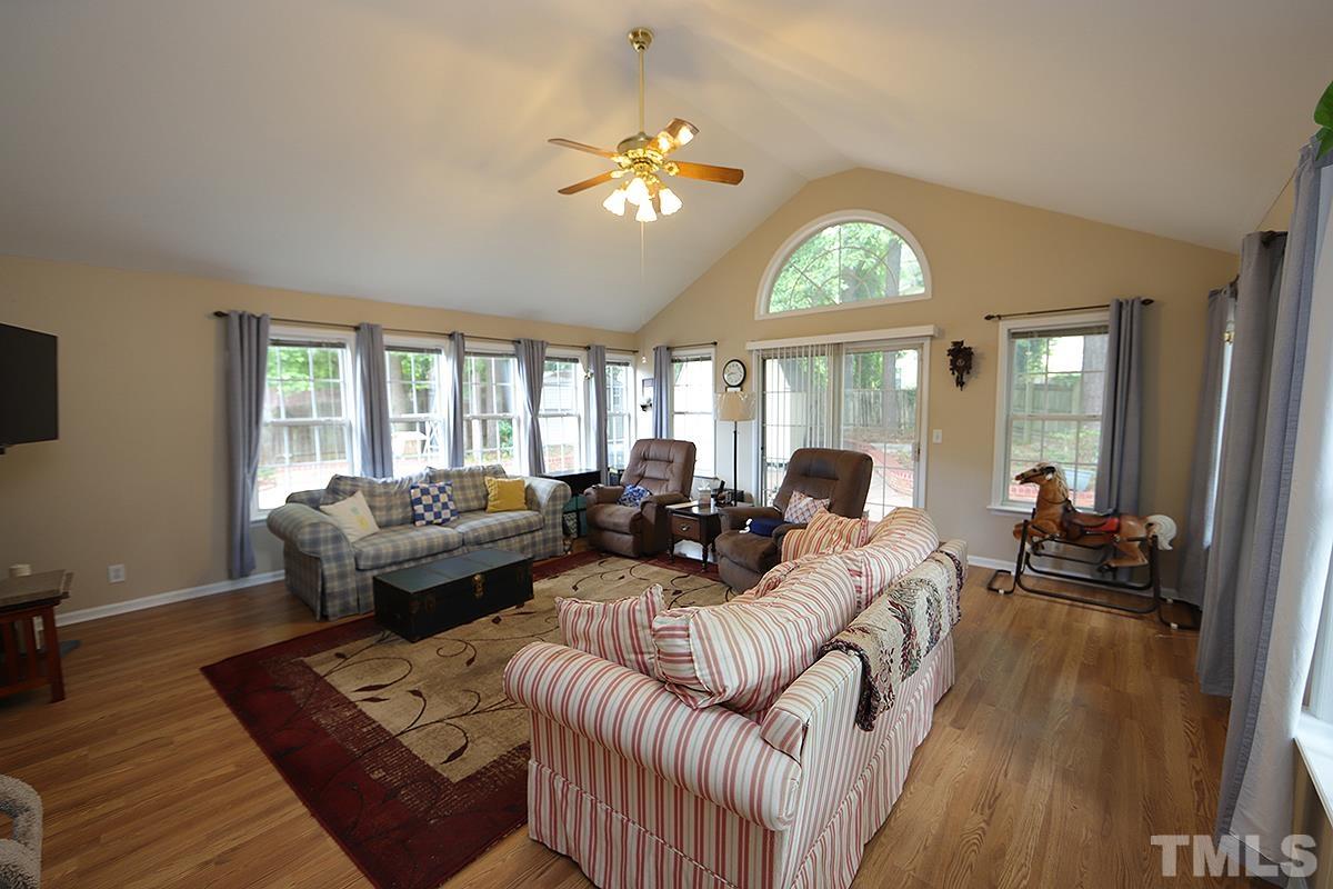 112 Dullis Circle Garner, NC 27529 - Photo 10 of 23 a living room with furniture and a large window