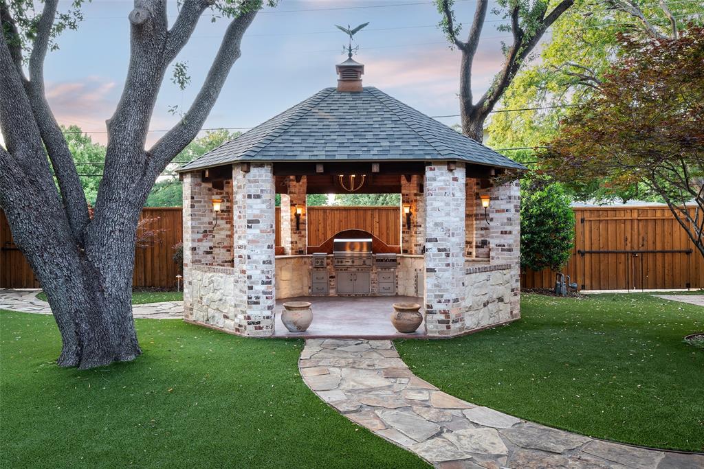 6139 Northaven Road Dallas, TX 75230 - Photo 30 of 33 Pergola with Outdoor Kitchen, and Lynx Grill