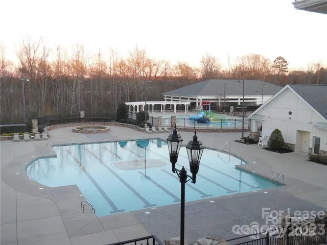 a view of a house with backyard