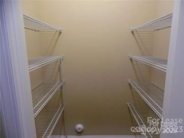 a bathroom with a sink and vanity