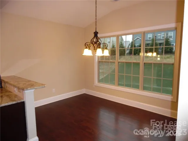 a view of a room with windows