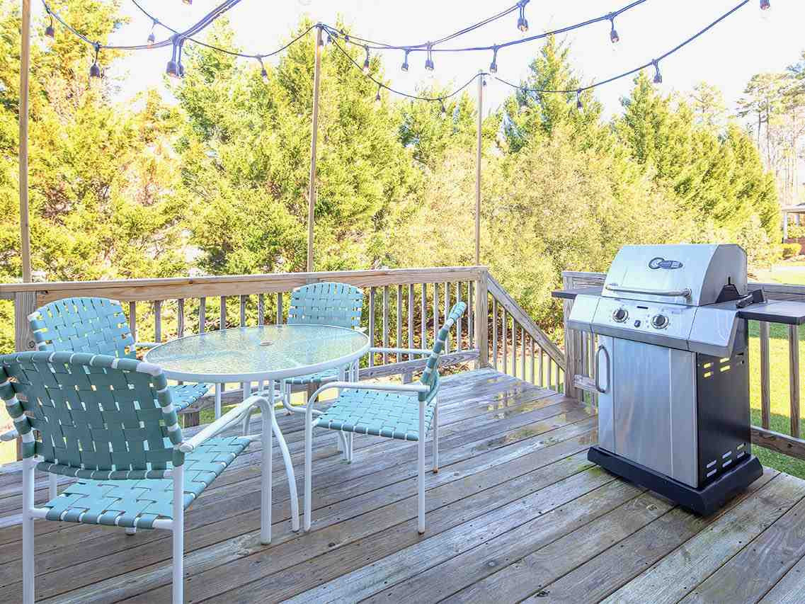 4 Hidden Ridge Court Durham, NC 27707 - Photo 25 of 27 With lots of trees behind you, the rear deck feels very private. Rear deck