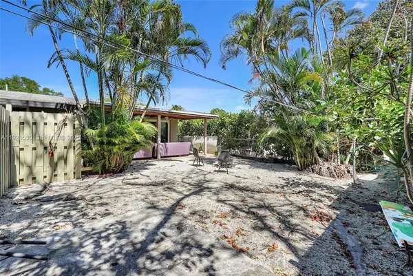 a view of a backyard of a house