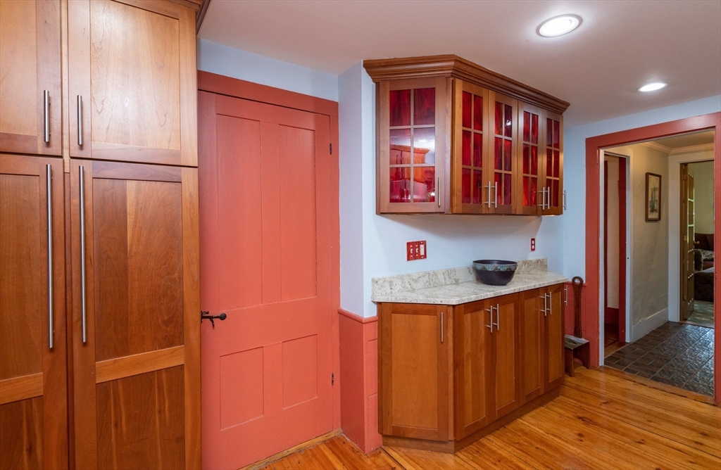 304 North Street Georgetown, MA 01833 - Photo 14 of 42 a kitchen with stainless steel appliances granite countertop a refrigerator and a sink