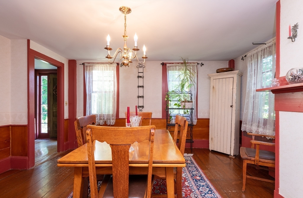 304 North Street Georgetown, MA 01833 - Photo 16 of 42 a view of a a dining room with furniture window and wooden floor