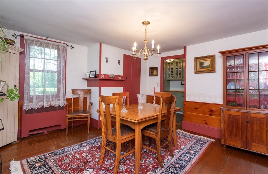 304 North Street Georgetown, MA 01833 - Photo 17 of 42 a view of a dining room with furniture window and wooden floor