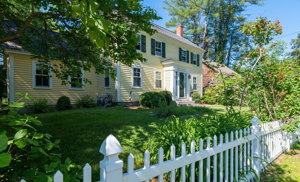 304 North Street Georgetown, MA 01833 - Photo 2 of 42 a house view with a garden space