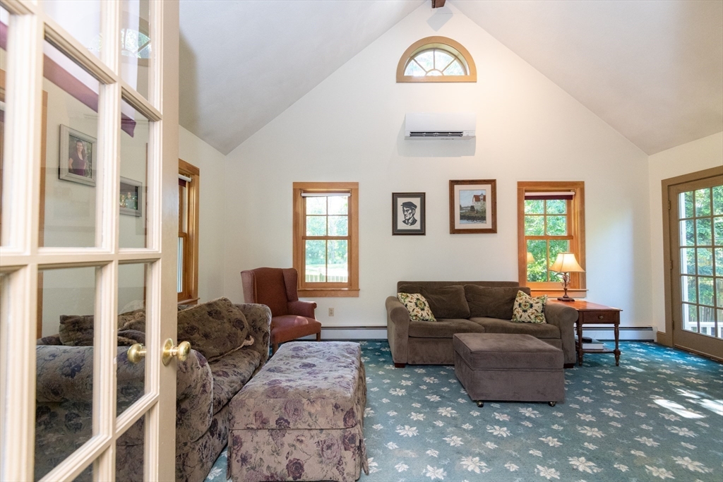 304 North Street Georgetown, MA 01833 - Photo 21 of 42 a living room with furniture and a window