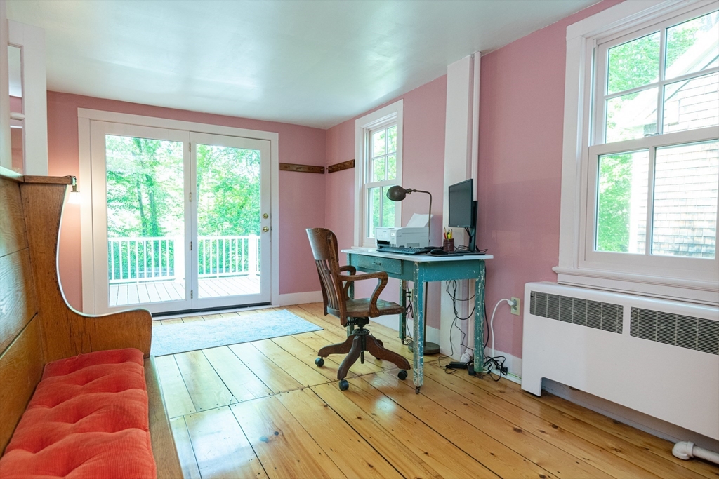 304 North Street Georgetown, MA 01833 - Photo 26 of 42 a workspace with furniture and a window
