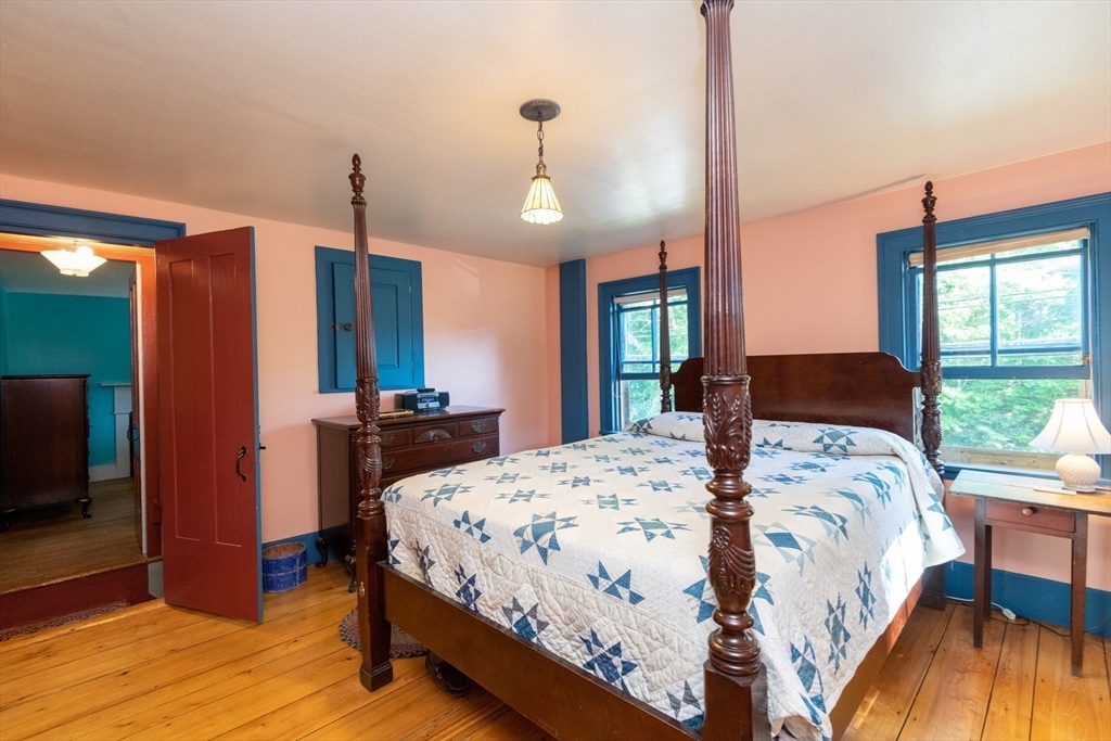 304 North Street Georgetown, MA 01833 - Photo 29 of 42 a bedroom with a bed a window and dresser
