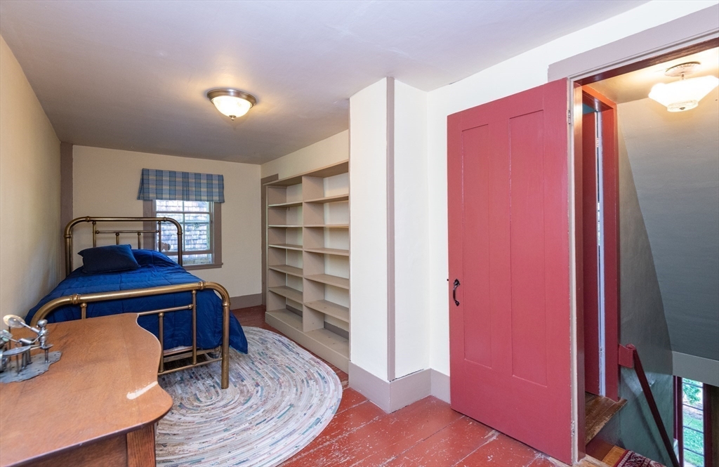 304 North Street Georgetown, MA 01833 - Photo 34 of 42 a room with furniture and wooden floor