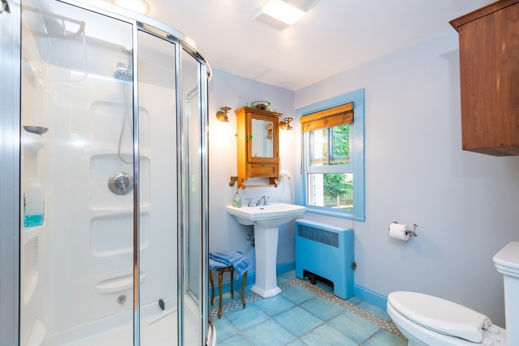 304 North Street Georgetown, MA 01833 - Photo 35 of 42 a bathroom with a sink toilet and shower