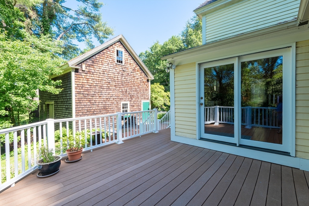 304 North Street Georgetown, MA 01833 - Photo 5 of 42 a view of a house with a deck